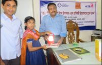 a man giving study materials to a girl